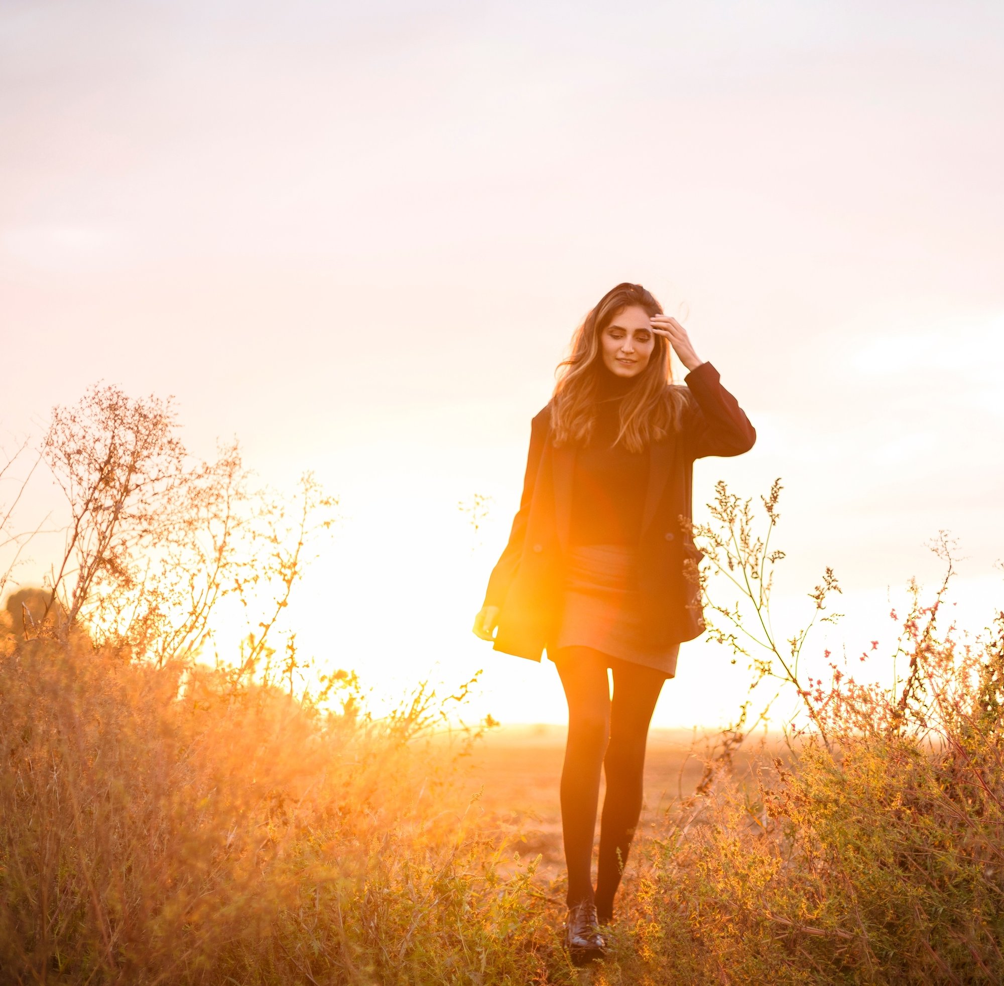 Woman-walking-sunset